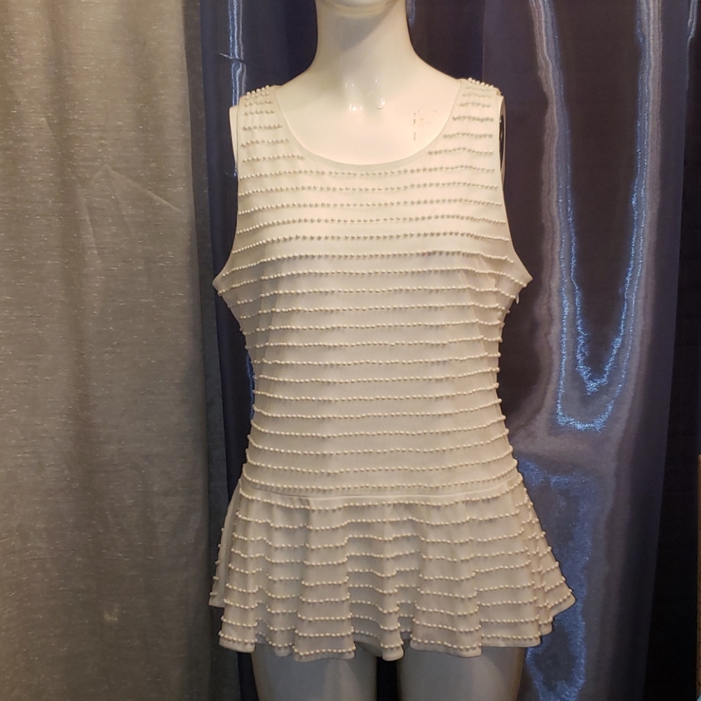 Jenner Lopez white beaded peblum top
